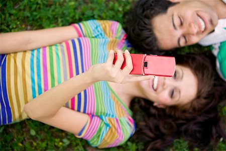 High angle view of a young couple smiling together Stock Photo - Premium Royalty-Free, Code: 625-01747354
