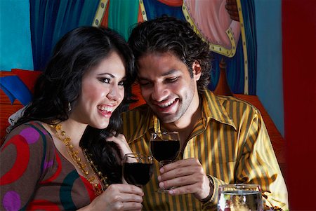 simsearch:625-00902698,k - Close-up of a young couple holding glasses of red wine Foto de stock - Sin royalties Premium, Código: 625-01747623