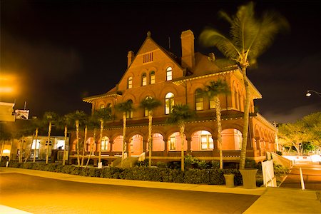 Low angle view of a museum lit up at night, Key West Museum Of Art And History, Key West, Florida, USA Stock Photo - Premium Royalty-Free, Code: 625-01749856
