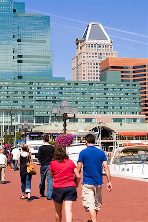 simsearch:625-01750061,k - Group of people walking on a pedestrian walkway, Inner Harbor, Baltimore, Maryland, USA Stock Photo - Premium Royalty-Free, Code: 625-01750092