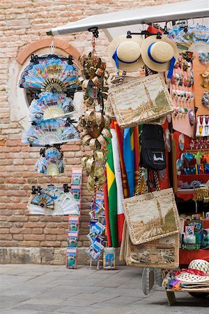Craft products hanging in a market stall, Venice, Italy Stock Photo - Premium Royalty-Free, Code: 625-01750750