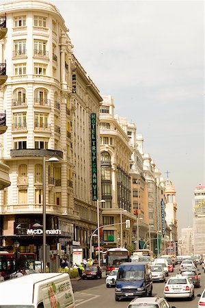 simsearch:625-00806447,k - Traffic on a road in front of a hotel, TRYP Gran Via Hotel, Gran Via, Madrid, Spain Stock Photo - Premium Royalty-Free, Code: 625-01750825