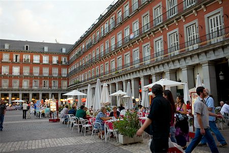 plaza - Tourists at a sidewalk cafe, Plaza Mayor, Madrid, Spain Stock Photo - Premium Royalty-Free, Code: 625-01750822