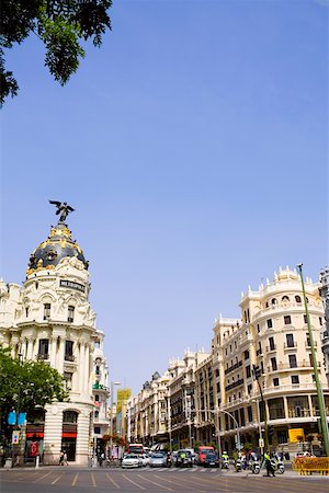 simsearch:625-01751332,k - Buildings along a road in a city, Metropolis Building, Madrid, Spain Stock Photo - Premium Royalty-Free, Code: 625-01750841
