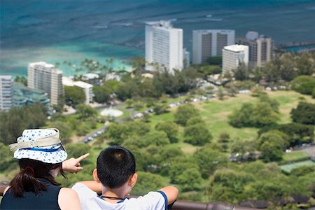 diamond head - Rear view of a boy and a girl looking at a city from an observation point, Diamond Head, Waikiki Beach, Honolulu, Oahu, Stock Photo - Premium Royalty-Free, Code: 625-01751184