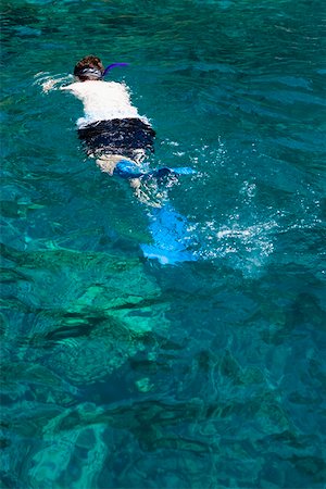Man snorkeling in the sea, Captain Cook's Monument, Kealakekua Bay, Kona Coast, Big Island, Hawaii Islands, USA Stock Photo - Premium Royalty-Free, Code: 625-01751237