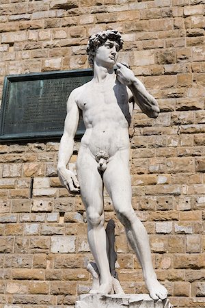 simsearch:625-01751332,k - Statue in front of a brick wall, Michelangelo's David, Piazza Della Signoria, Florence, Italy Stock Photo - Premium Royalty-Free, Code: 625-01751332