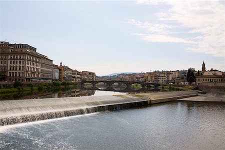 simsearch:625-01751332,k - Arch bridge across a river, Arno River, Florence, Italy Stock Photo - Premium Royalty-Free, Code: 625-01751341