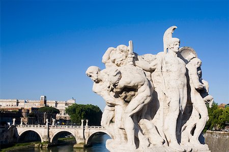 simsearch:625-01751332,k - Close-up of statues in front of an arch bridge, Ponte Sant Angelo Tiber River, Rome, Italy Stock Photo - Premium Royalty-Free, Code: 625-01751367