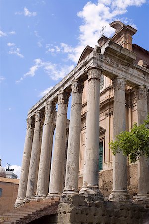 simsearch:630-03481463,k - Low angle view of the old ruins of a temple, Faustina Temple, Rome, Italy Stock Photo - Premium Royalty-Free, Code: 625-01751436