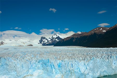 perito moreno glacier - Glacier in a lake with mountains in the background, Moreno Glacier Argentine Glaciers National Park, Lake Argentino, El Calafate, Stock Photo - Premium Royalty-Free, Code: 625-01751589