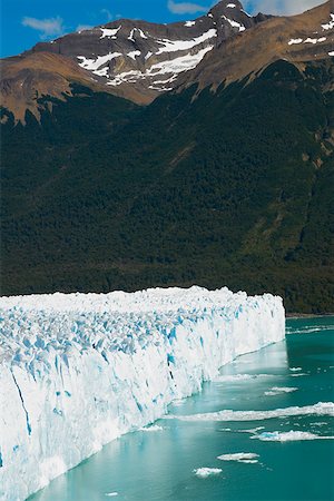 perito moreno glacier - Glacier in a lake with a mountain in the background, Moreno Glacier Argentine Glaciers National Park, Lake Argentino, El Calafate, Stock Photo - Premium Royalty-Free, Code: 625-01751606