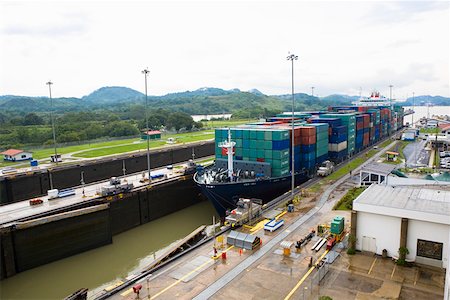 panama canal shipping - Cargo containers in a container ship at a commercial dock, Panama Canal, Panama Stock Photo - Premium Royalty-Free, Code: 625-01751671