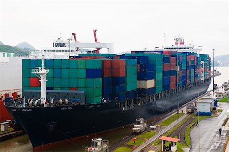 panama canal shipping - Cargo containers in a container ship at a commercial dock, Panama Canal, Panama Stock Photo - Premium Royalty-Free, Code: 625-01751694