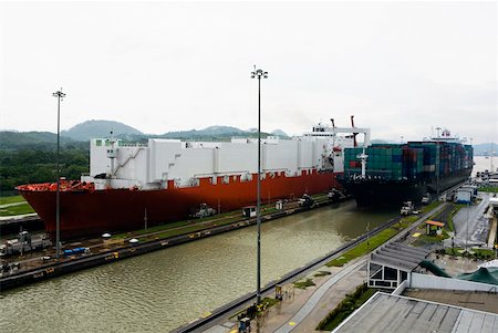 panama canal shipping - Container ship and cargo containers at a commercial dock, Panama Canal, Panama Stock Photo - Premium Royalty-Free, Code: 625-01751700