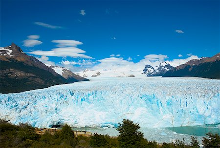 perito moreno glacier - Glacier surrounded by mountains, Moreno Glacier, Argentine Glaciers National Park, Lake Argentino, El Calafate, Patagonia Stock Photo - Premium Royalty-Free, Code: 625-01751717