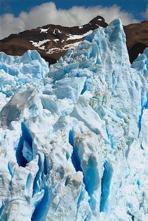 perito moreno glacier - Glaciers in front of a mountain, Moreno Glacier, Argentine Glaciers National Park, Lake Argentino, El Calafate, Patagonia Stock Photo - Premium Royalty-Free, Code: 625-01751737