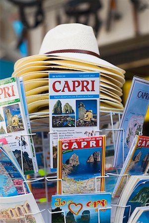 Magazines and sun hats at a market stall, Capri, Campania, Italy Stock Photo - Premium Royalty-Free, Code: 625-01752004