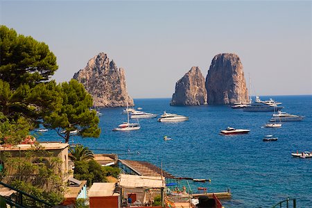 Boats in the sea, Faraglioni Rocks, Capri, Campania, Italy Stock Photo - Premium Royalty-Free, Code: 625-01752043