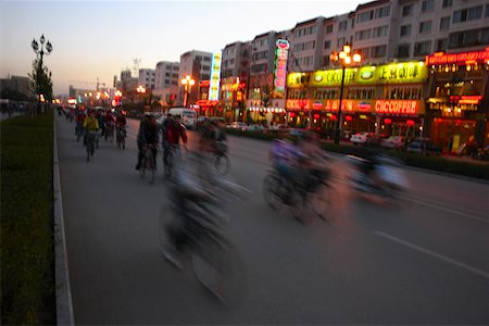 road market - Group of people riding bicycles on the road, Beijing, China Stock Photo - Premium Royalty-Free, Code: 625-01752755
