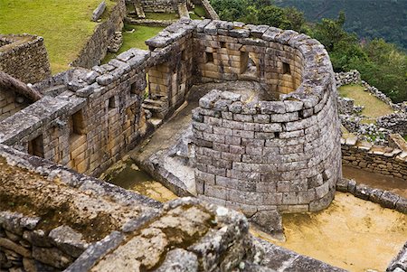 simsearch:630-03481463,k - High angle view of the ruins of a temple, Temple of The Sun, Machu Picchu, Urubamba Valley, Cuzco, Peru Stock Photo - Premium Royalty-Free, Code: 625-01753127