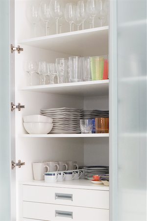 Crockery in a kitchen shelf Stock Photo - Premium Royalty-Free, Code: 625-02265785