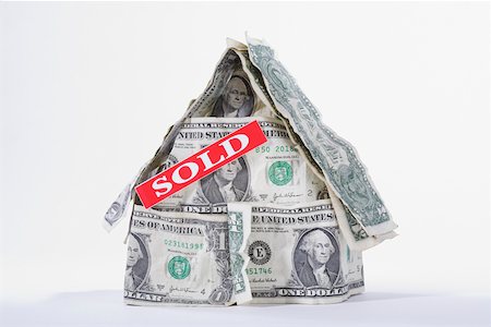 sold sign - SOLD signboard on a miniature house made up of US dollar bills Stock Photo - Premium Royalty-Free, Code: 625-02265969