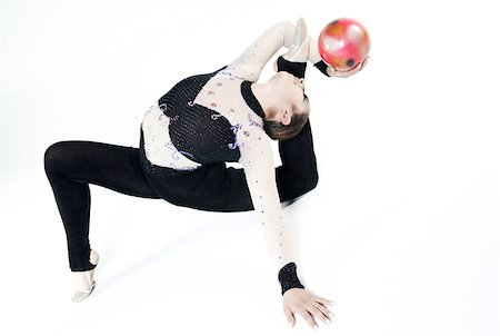 Female gymnast practicing with a ball Stock Photo - Premium Royalty-Free, Code: 625-02266352