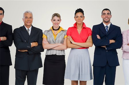 simsearch:625-02931717,k - Portrait of three businesswomen and two businessmen standing side by side with their arms crossed Stock Photo - Premium Royalty-Free, Code: 625-02266695
