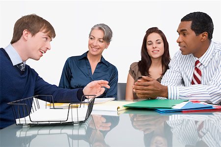 simsearch:630-03479740,k - Business executives at a meeting in an office Stock Photo - Premium Royalty-Free, Code: 625-02267220