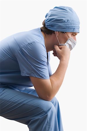 simsearch:625-02929180,k - Side profile of a male surgeon thinking Stock Photo - Premium Royalty-Free, Code: 625-02267311