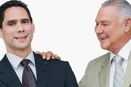 simsearch:625-02931717,k - Close-up of a businessman putting his hand on another businessman's shoulders Stock Photo - Premium Royalty-Free, Code: 625-02267795