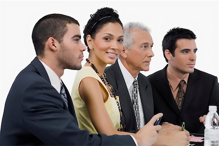 family plan - Trois hommes et une femme d'affaires lors d'une réunion dans une salle de conférence Photographie de stock - Premium Libres de Droits, Code: 625-02267834