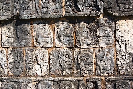 simsearch:630-03481463,k - Close-up of skulls carved on the wall, Chichen Itza, Yucatan, Mexico Stock Photo - Premium Royalty-Free, Code: 625-02267909