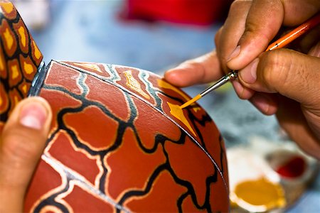 simsearch:700-03456784,k - Close-up of a person's hand painting on a ceramics, Arrazola, Oaxaca State, Mexico Stock Photo - Premium Royalty-Free, Code: 625-02267954