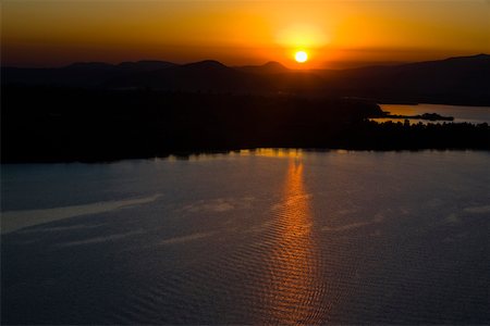 Sunset over a mountain range, Janitzio Island, Lake Patzcuaro, Morelia, Michoacan State, Mexico Stock Photo - Premium Royalty-Free, Code: 625-02267998