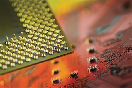 Close-up of a CPU on a mother board Stock Photo - Premium Royalty-Free, Code: 625-02926569