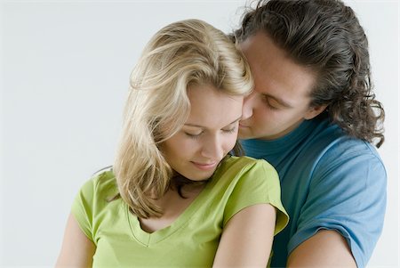 sexual woman on top of man - Close-up of a young couple romancing Stock Photo - Premium Royalty-Free, Code: 625-02926666