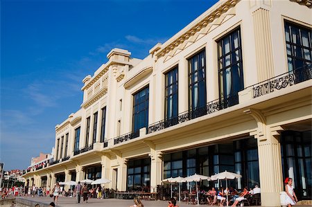 Group of people in front of a hotel, Casino Municipal, Grande Plage, Biarritz, France Stock Photo - Premium Royalty-Free, Code: 625-02928657