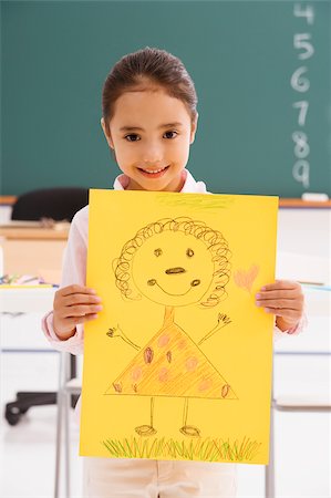 showing - Portrait d'une écolière montrant son dessin et souriant Photographie de stock - Premium Libres de Droits, Code: 625-02928953