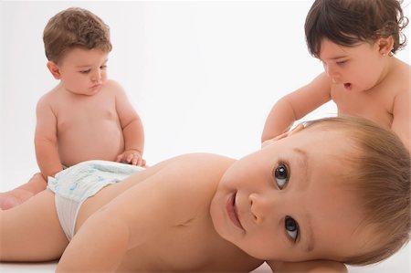 simsearch:625-02929316,k - Close-up of two baby boys with a girl Stock Photo - Premium Royalty-Free, Code: 625-02929267