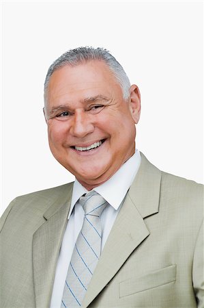 simsearch:625-02931717,k - Close-up of a businessman smiling Stock Photo - Premium Royalty-Free, Code: 625-02929424