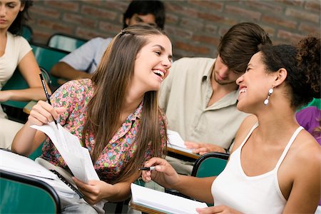 University students sitting in a classroom and smiling Stock Photo - Premium Royalty-Free, Code: 625-02929721