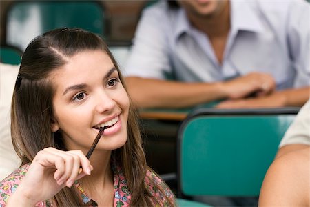 Young woman in a classroom Stock Photo - Premium Royalty-Free, Code: 625-02929761