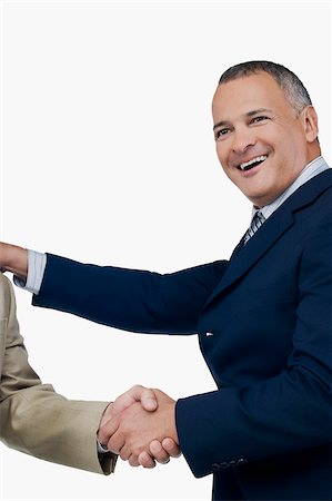 Businessman shaking hands with another businessman Foto de stock - Sin royalties Premium, Código: 625-02930027