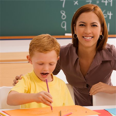 pencil painting pictures images kids - Female teacher helping her student in drawing Stock Photo - Premium Royalty-Free, Code: 625-02930434