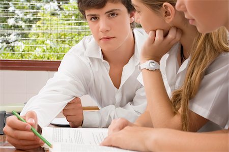 simsearch:614-06895765,k - Close-up of school students studying together in a classroom Stock Photo - Premium Royalty-Free, Code: 625-02930929