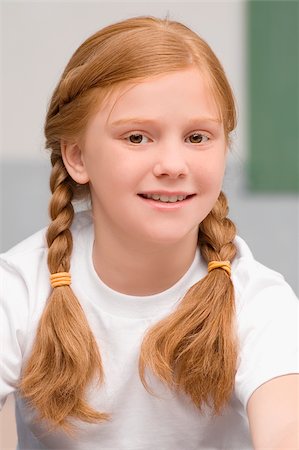 simsearch:614-06895765,k - Portrait of a schoolgirl smiling Stock Photo - Premium Royalty-Free, Code: 625-02930991