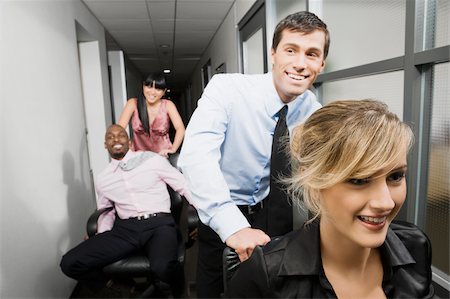 simsearch:625-02931998,k - Office workers playing in an office Stock Photo - Premium Royalty-Free, Code: 625-02931263