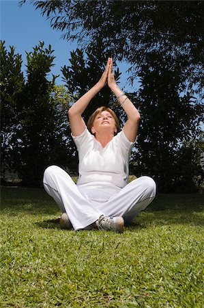 Senior woman meditating Stock Photo - Premium Royalty-Free, Code: 625-02931571
